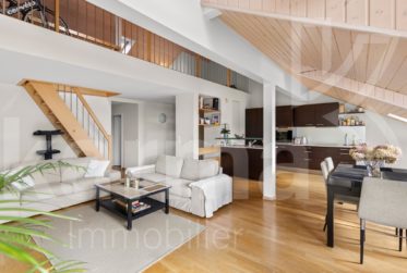 En exclusivité - Appartement en attique avec vue sur le lac et les Alpes
